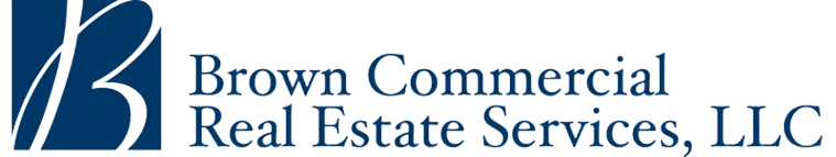 A black and white photo of the words " north common estate sales."